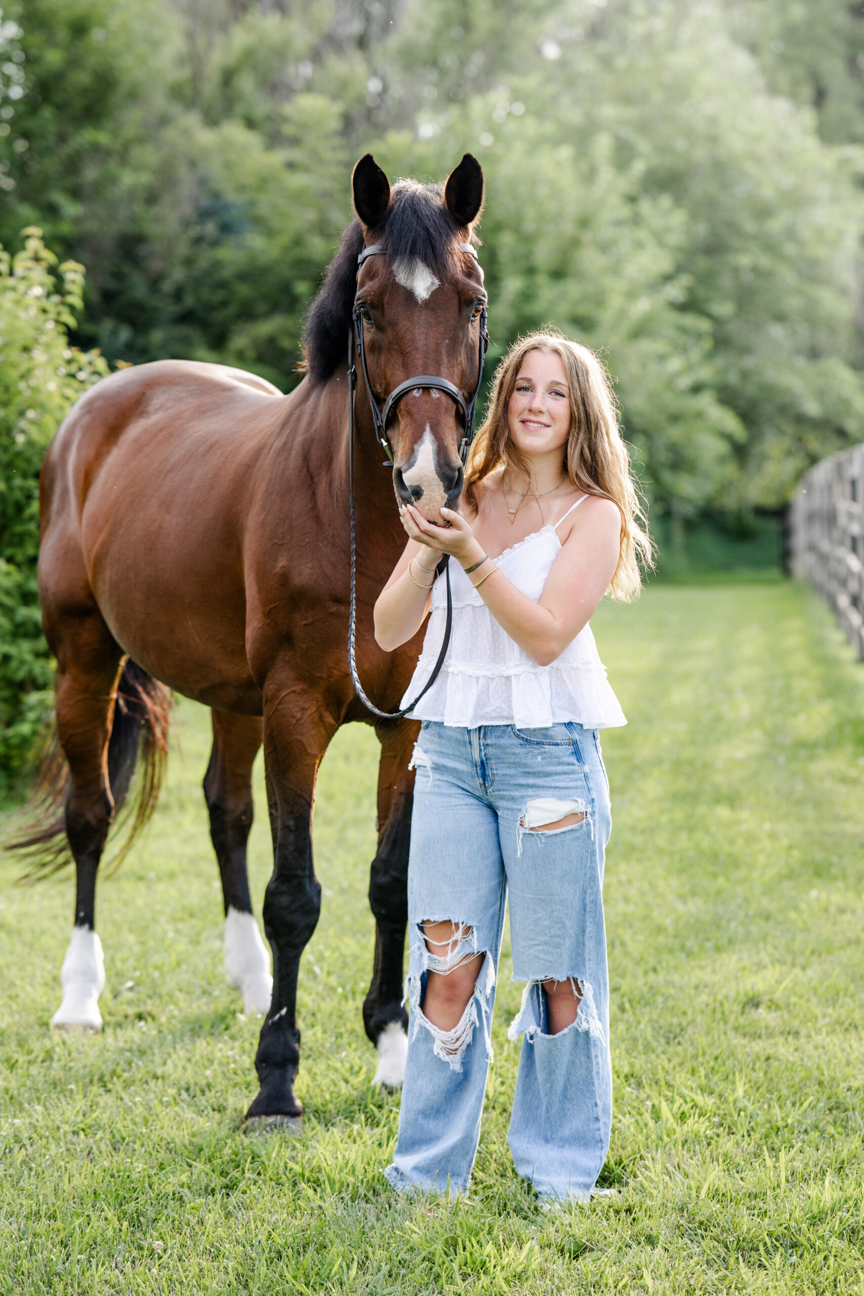 Equestrian high school senior takes her senior photos with her horse in Carmel, Indiana, captured by Kate Kosnoff